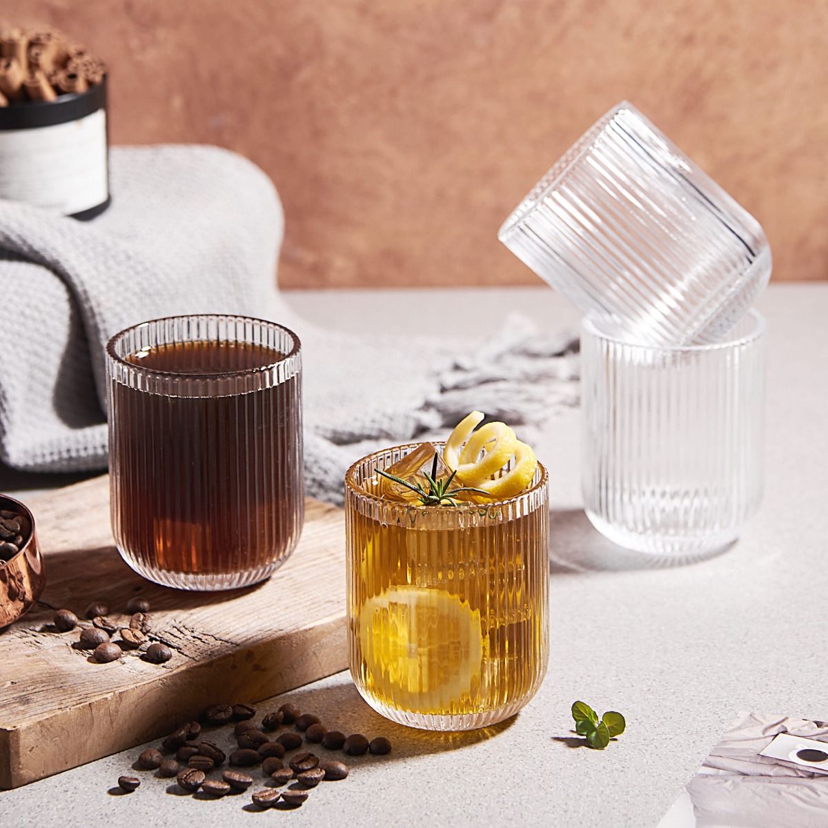 Ribbed drinking glass in use