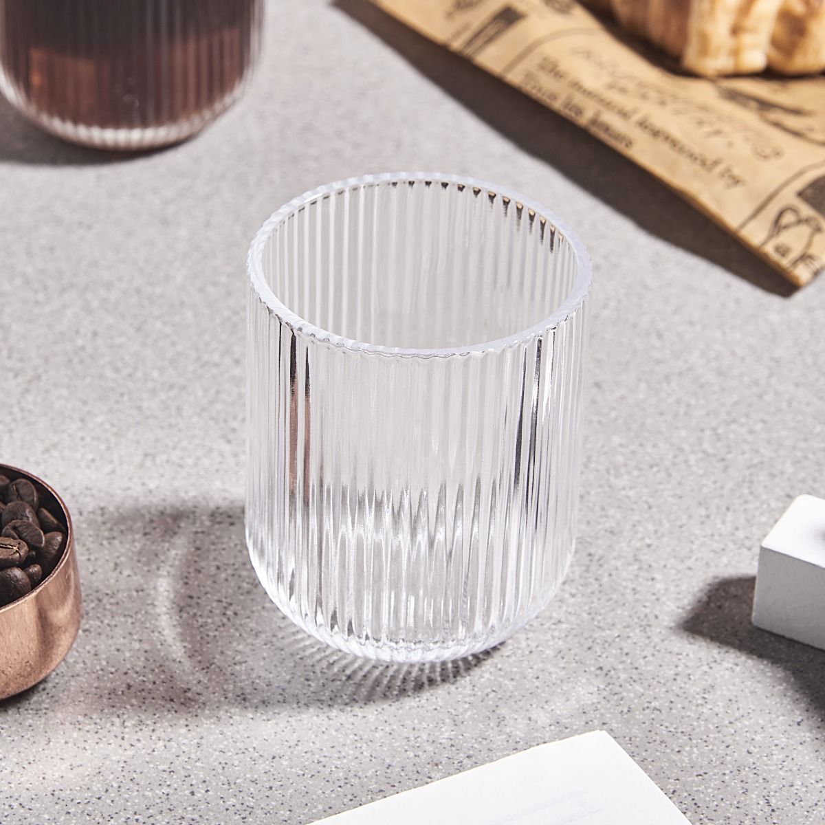 Ribbed drinking glass