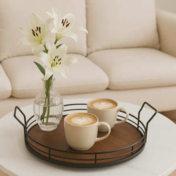 Round metal serving tray with wooden base displaying elegant tea setup with cups and cookies

34cm decorative metal tray with wooden base used as coffee table centerpiece with candles and decor